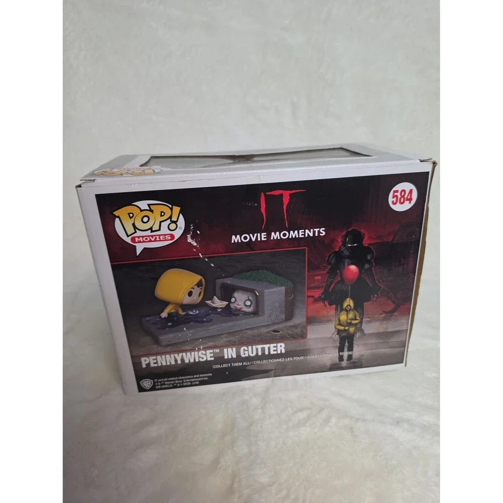 Funko Pop! Movie Moments vinyl figure set featuring Pennywise in the Gutter #584 - Picture 2 of 2